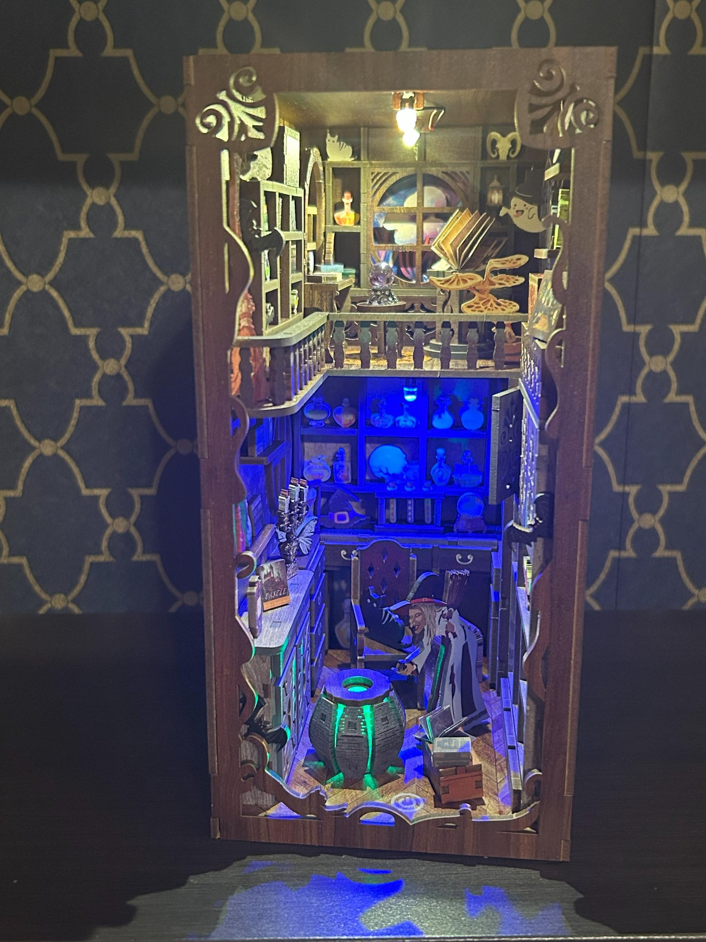 Assembled and Embellished Halloween themed book nook called "Magic Night"