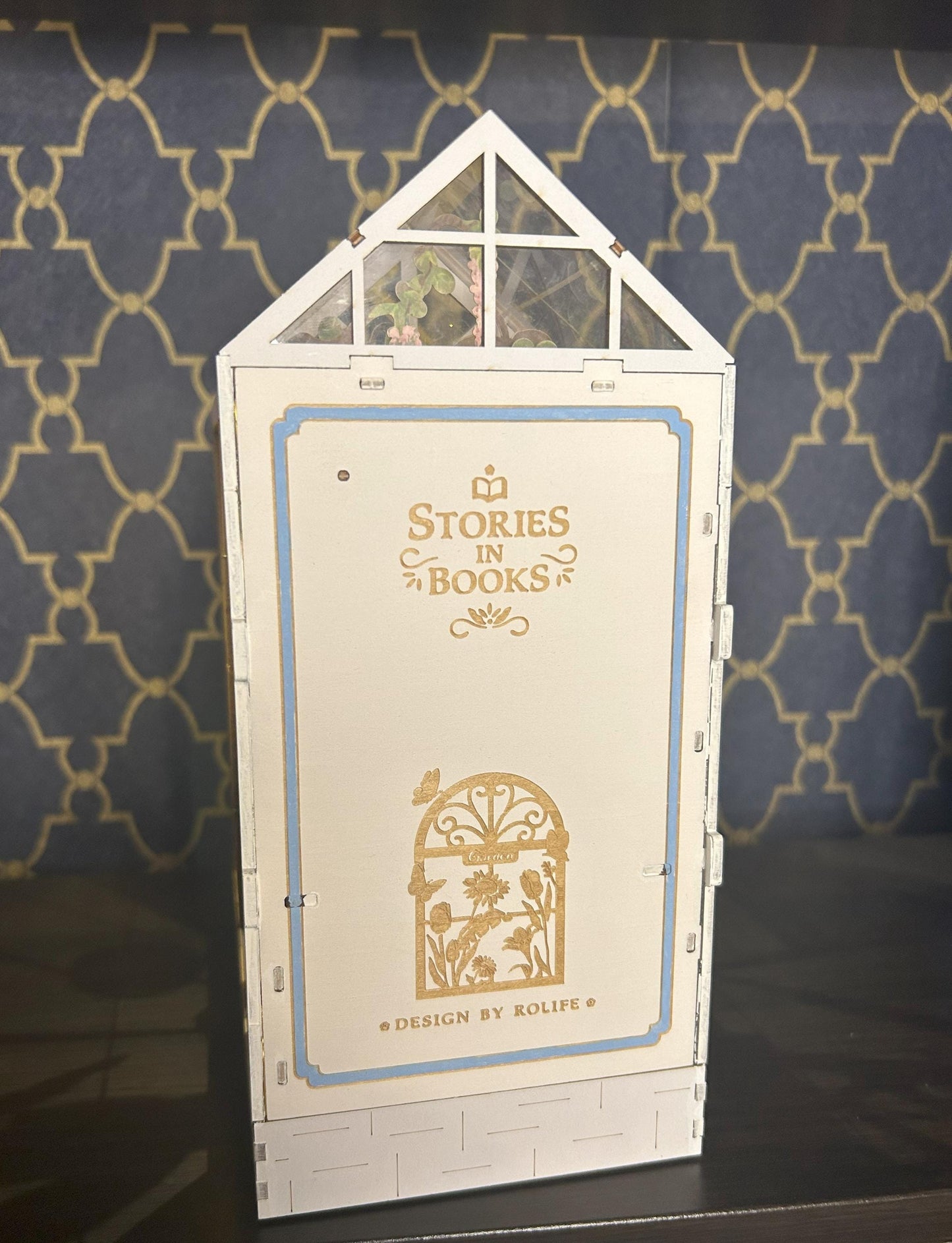 Assembled and Embellished Garden Greenhouse Book Nook