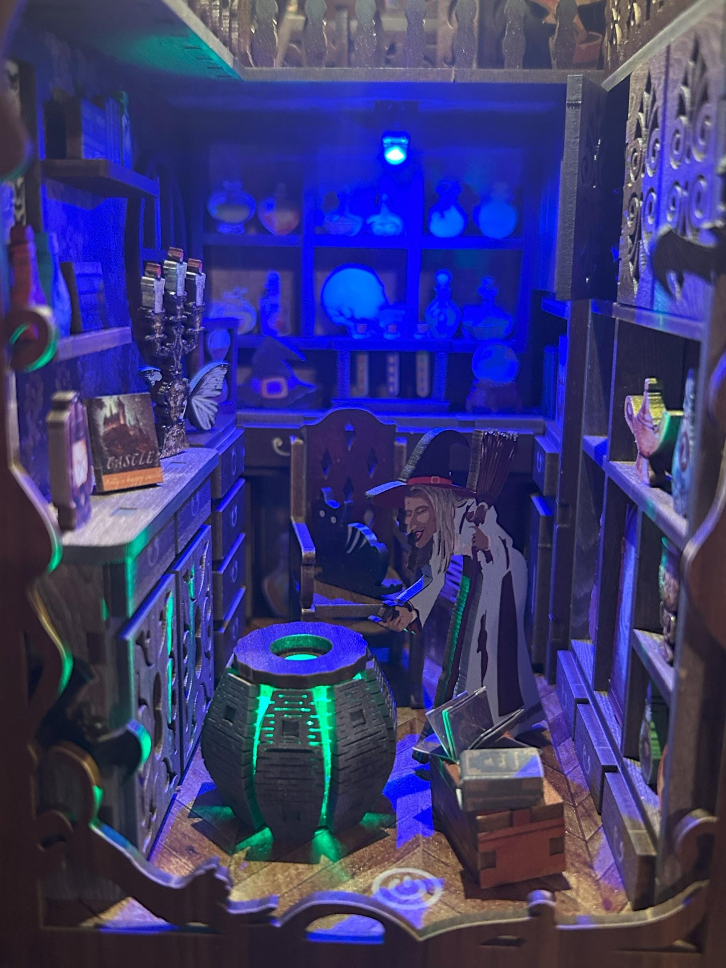Assembled and Embellished Halloween themed book nook called "Magic Night"