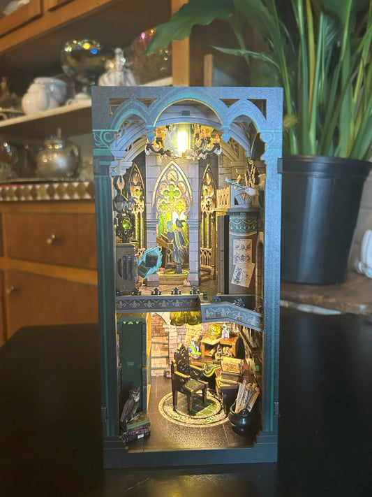 Wizard Inspired book nook called "Darkness Common Room"