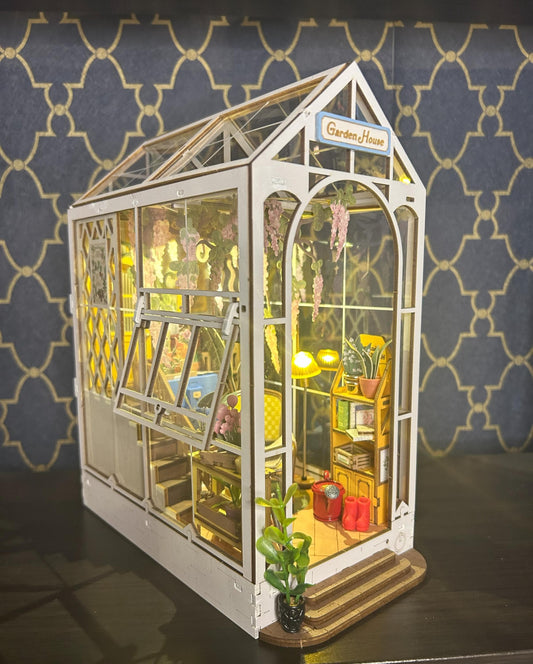 Assembled and Embellished Garden Greenhouse Book Nook